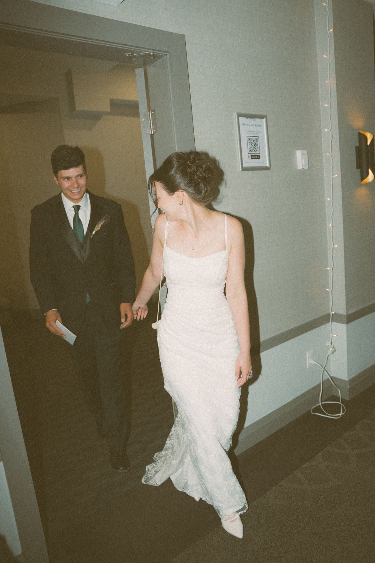 Priscilla and Ryan walking together through the manor