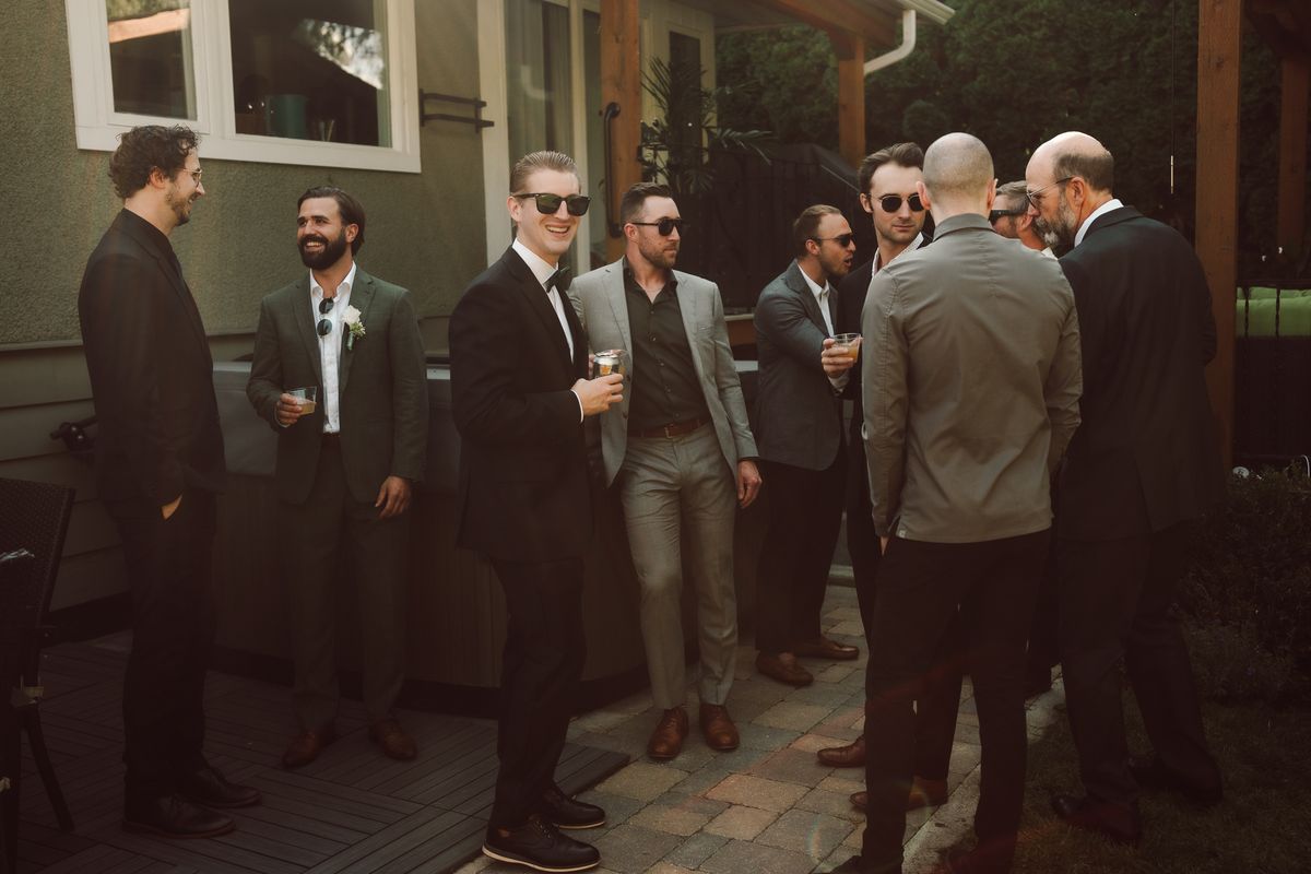The groom with his groomsmen gathering before the ceremony