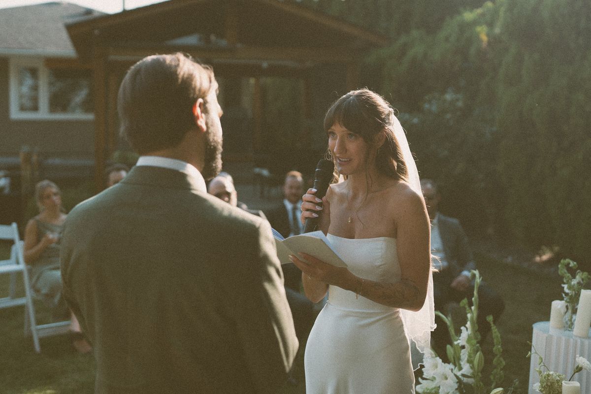 Mariah and Ryan exchanging their vows