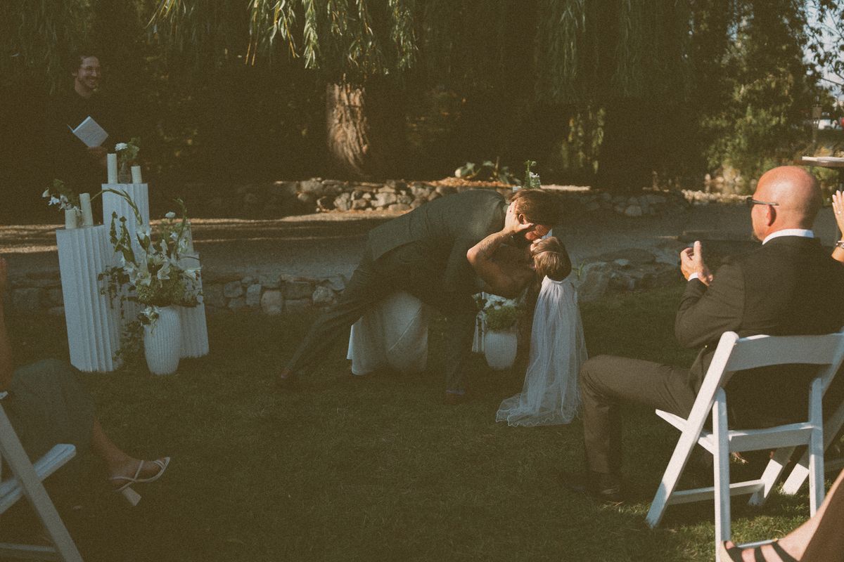 The creekside ceremony as a guest captures the moment