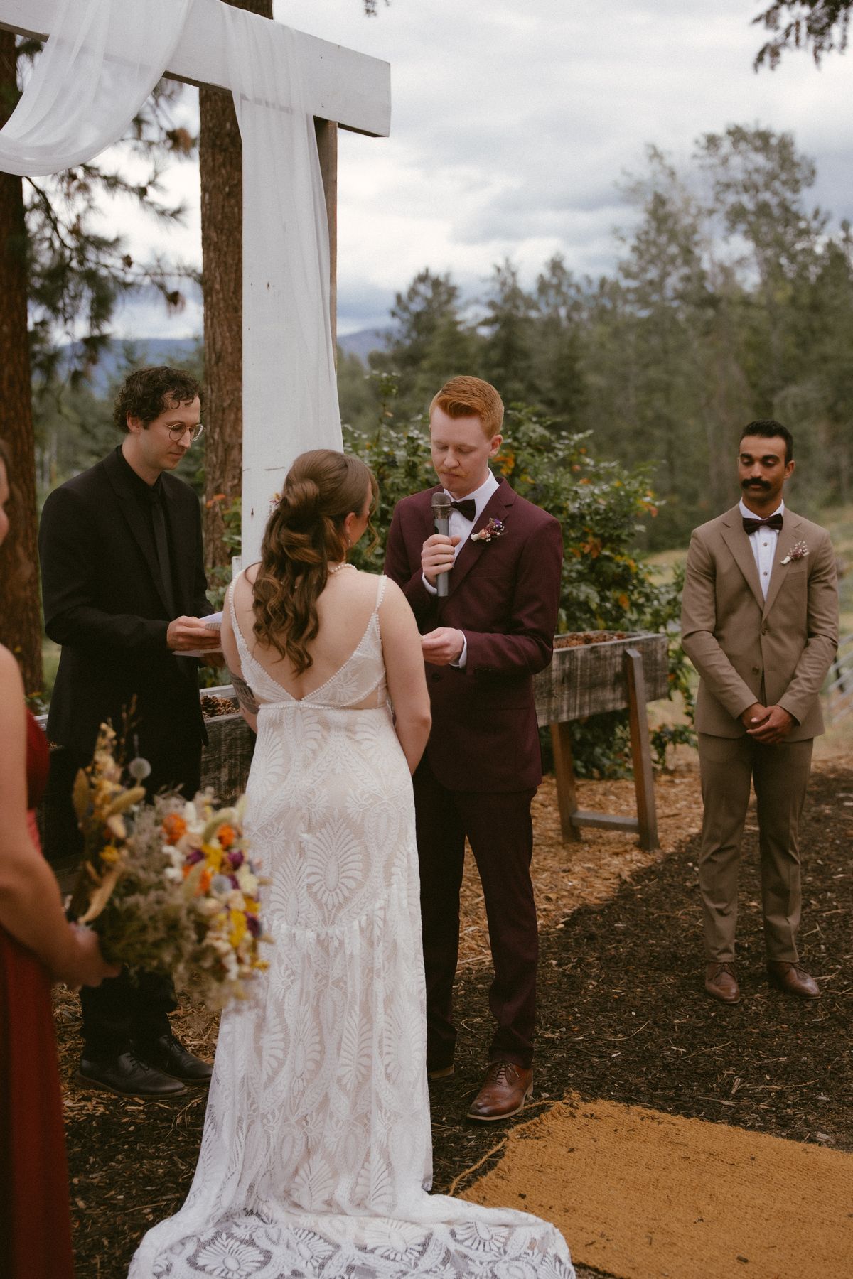 Gabby and Nicolas walking back up the aisle after the ceremony